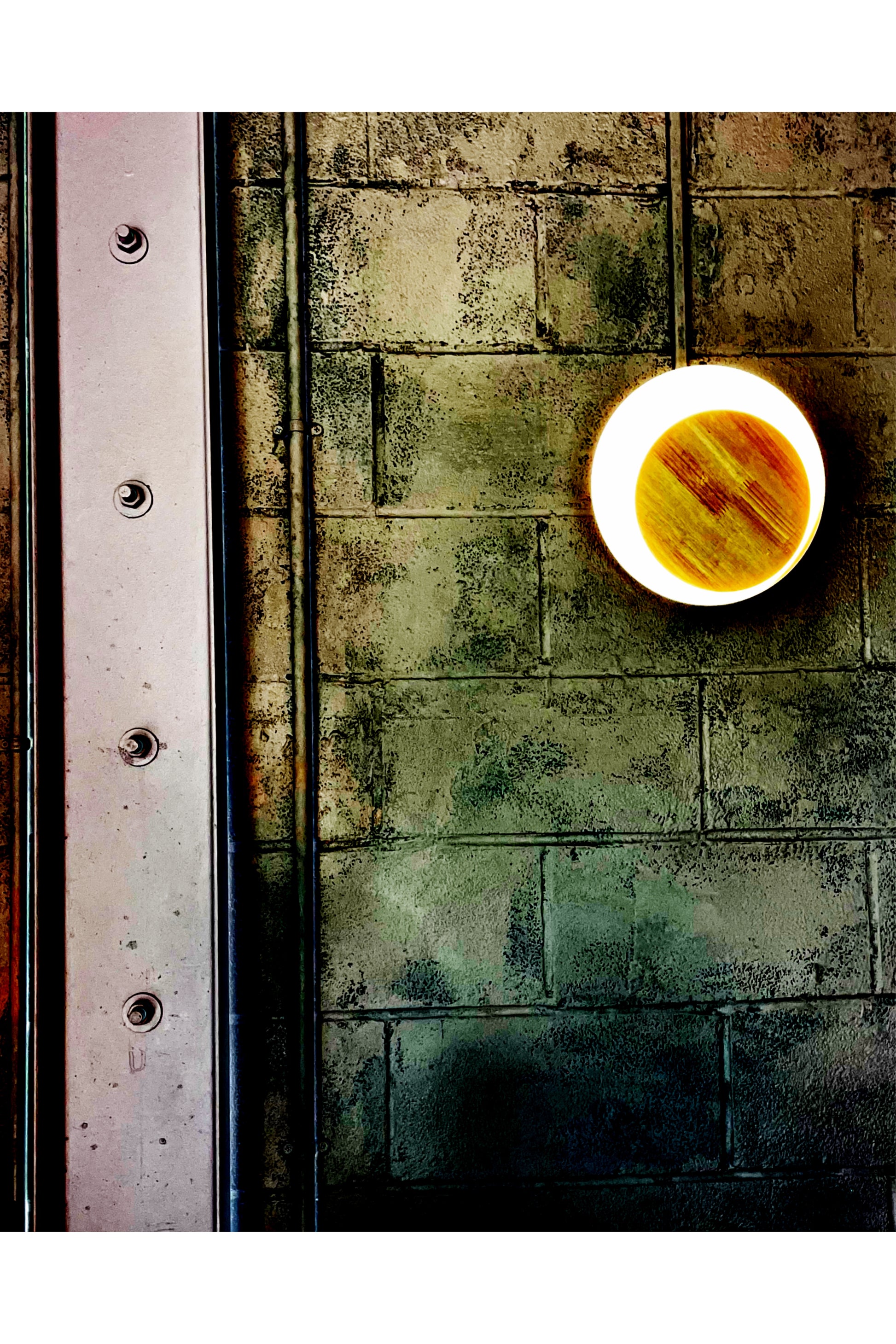 Ceramic plate with a colorful design on a textured surface